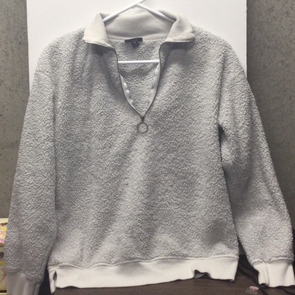 Woman’s fairly new Sherpa pull over